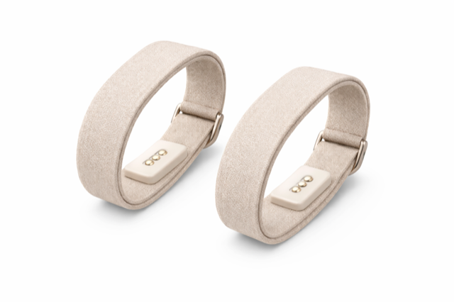 MAiZU pulse-sensing wristbands — two elegant beige fabric bands with embedded sensors